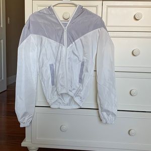 Womens size small white and grey windbreaker.